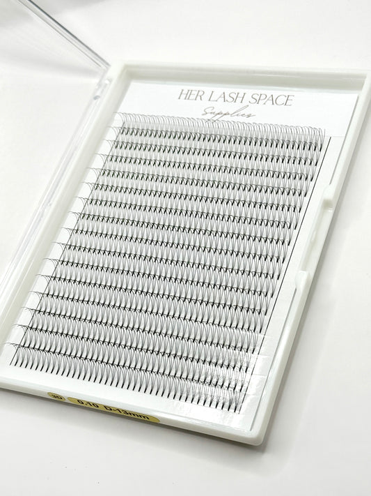 Close-up of 3D .10 pre-made fans showing the short stem and D curl